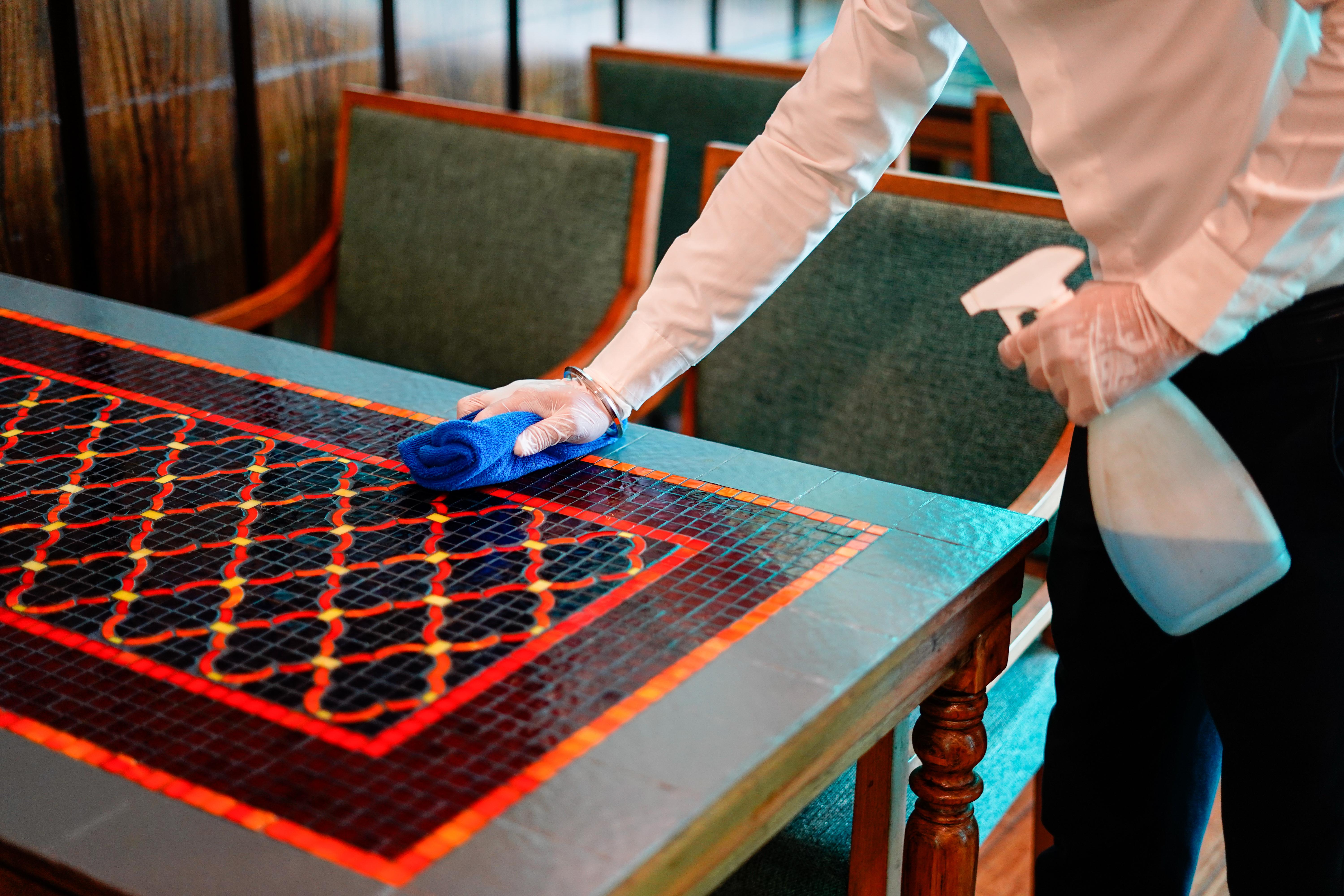 Novotel Goa Resort & Spa Candolim Eksteriør billede A hotel housekeeper wiping down a table